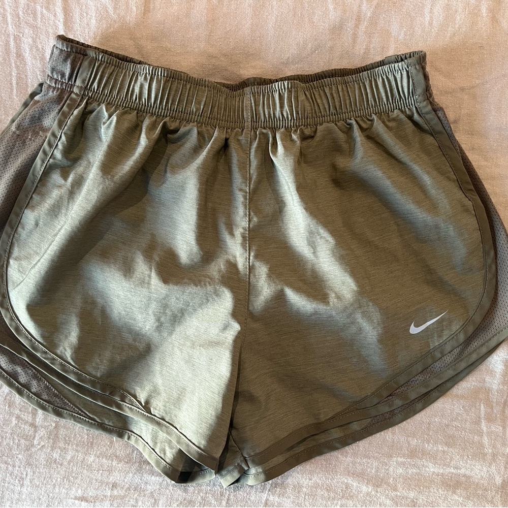 Nike Green Athletic Shorts with Curved Hem and Elastic Waistband